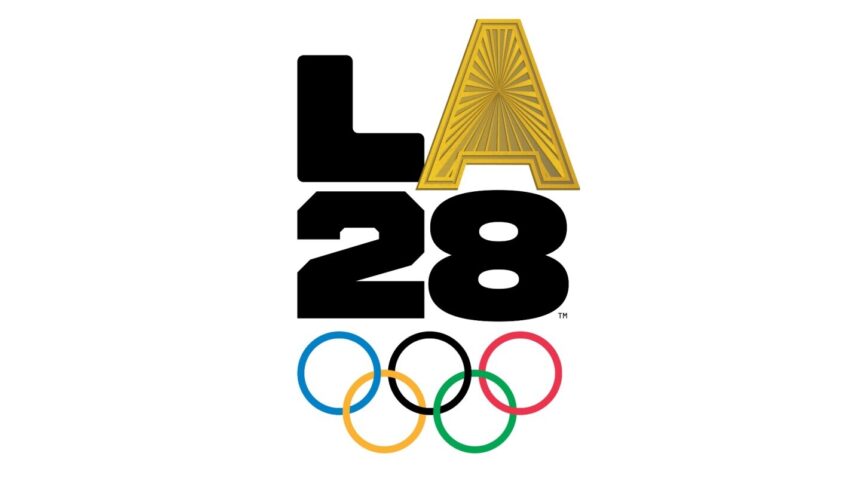LA 2028 Olympic logo bold black 2028 with a gold A perched on top and the five interlocking Olympic rings below  trybalnews