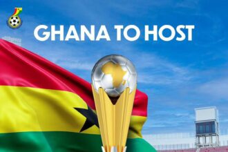 Poster announcing Ghana to host the CAF U-20 Africa Cup of Nations 2027, featuring the trophy, Ghana flag, and stadium background.