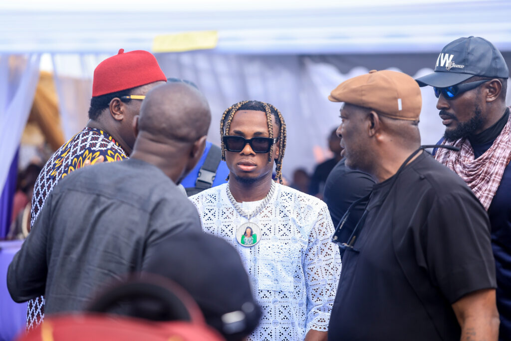 Ikorodu City vs Enugu Rangers Nigeria Premier Football League Lagos State Nigeria Trybal News Group of people at an outdoor event surrounding a person in a white lace top with sunglasses engaging in conversation trybalnews