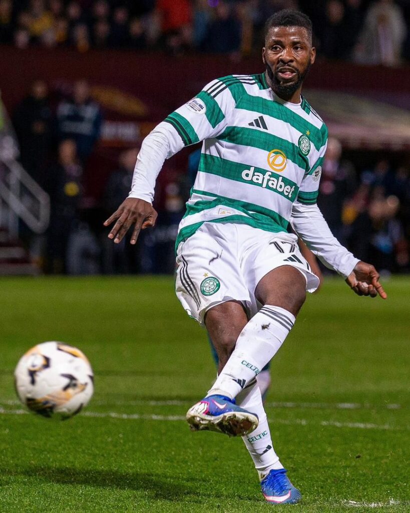 WhatsApp Image 20260513 at 231711 Trybal News Soccer player in Celtic green and white hoops kicking a ball on a grassy pitch during a match trybalnews