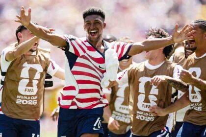 USA's Alex Freeman celebrates with teammates after scoring vs Australia, FIFA World Cup 2026 Group D at Seattle Stadium.