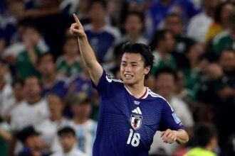Japan's forward #18 Ayase Ueda celebrates after scoring his team second goal during the 2026 World Cup Group F football match between Tunisia and Japan at the Monterrey Stadium in Guadalupe, Mexico, on June 20, 2026. (Photo by Julio Cesar AGUILAR / AFP via Getty Images)