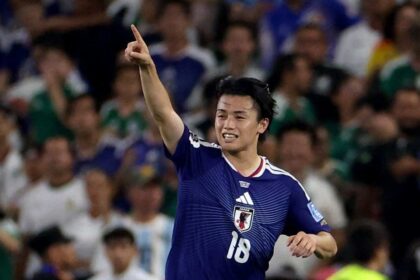 Japan's forward #18 Ayase Ueda celebrates after scoring his team second goal during the 2026 World Cup Group F football match between Tunisia and Japan at the Monterrey Stadium in Guadalupe, Mexico, on June 20, 2026. (Photo by Julio Cesar AGUILAR / AFP via Getty Images)