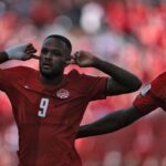 Canadas forward Cyle Larin L celebrates after scoring a goal during the 2026 World Cup Group B football match between Canada and Bosnia and Herzegovina at the Toronto Stadium  trybalnews