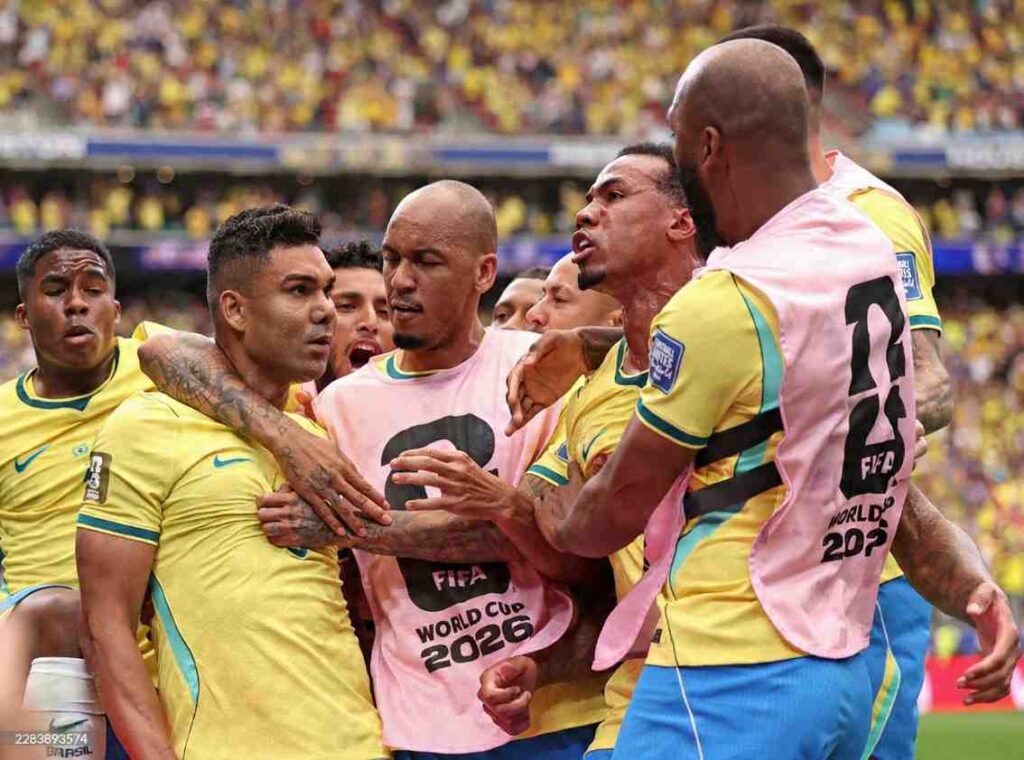 Casemiro Trybal News Brazil midfielder Casemiro wearing a yellow 5 Brazil kit with blue trim and the Nike crest celebrates with teammates after scoring Brazils first goal He is embraced in a tight huddle with other Brazil players in yellow kits and pink FIFA World Cup 2026 training bibs The FIFA World Cup 2026 Round of 32 match between Brazil and Japan took place on June 29 2026 at Houston Stadium in Houston Texas A sea of yellow clad fans fills the stadium in the background trybalnews