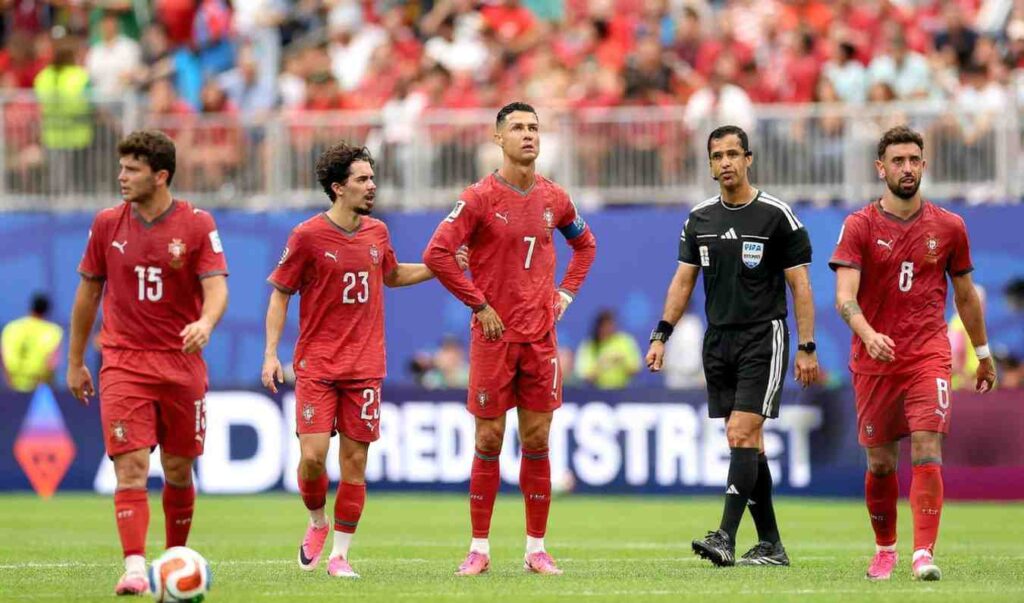 Cristiano Ronaldo Trybal News Portugal captain Cristiano Ronaldo reacts with teammates after DR Congos Yoane Wissa 20 scores the equalizer in the FIFA World Cup 2026 Group K match between Portugal and DR Congo at Houston Stadium Houston Texas trybalnews