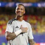 Eloy Room Curaçao goalkeeper wearing number 1 gray jersey places hand over heart and applauds fans after a 0 0 draw at Kansas City Stadium during FIFA World Cup 2026 Group E match vs Ecuador on June 20 2026  trybalnews