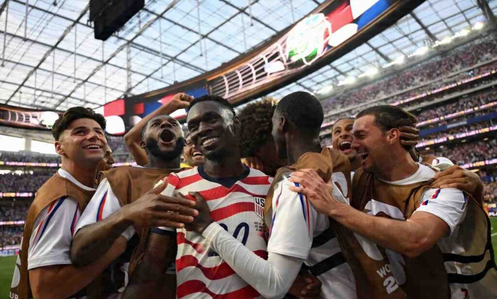 Folarin Balogun celebrates with teammates as the United States USA opened their 2026 FIFA World Cup campaign with an emphatic 4 1 victory over Paraguay at SoFi Stadium in Los Angeles on Saturday morning  trybalnews