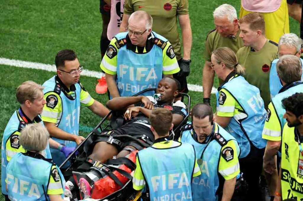 Canadaaposs Ismael Kone is stretchered off after a foul by Qataraposs Assim Madibo during FIFA World Cup 2026 BC Place Vancouver June 18 2026 FIFA medical staff surround him on the pitch  trybalnews