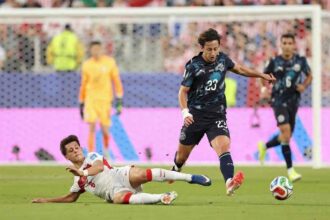 Paraguay midfielder Matias Galarza is tackled by Turkey's Arda Guler during FIFA World Cup 2026 Group D match at San Francisco Bay Area Stadium in Santa Clara, California, June 19 2026.