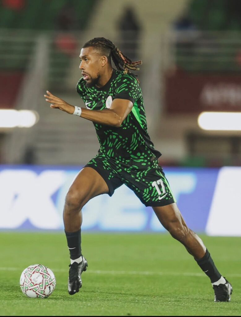WhatsApp Image 20260609 at 081441 Trybal News Soccer player in a green and black kit with number 17 dribbling the ball on a grass field during a match trybalnews