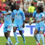 DR Congo forward Yoane Wissa celebrates with teammates after scoring DR Congos first goal in the FIFA World Cup 2026 Group K match against Portugal at Houston Stadium Houston Texas  trybalnews