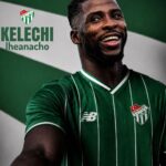 Portrait of Kelechi Iheanacho smiling in a green Bursaspor jersey with the team crest visible on the left  trybalnews