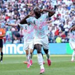 Belgium forward Romelu Lukaku 9 celebrates with hands to ears after scoring Belgiums fourth goal during the 2026 FIFA World Cup Round of 16 match between USA and Belgium at Seattle Stadium in Seattle on July 6 2026 Belgium teammates 5 and 8 celebrate behind him  trybalnews