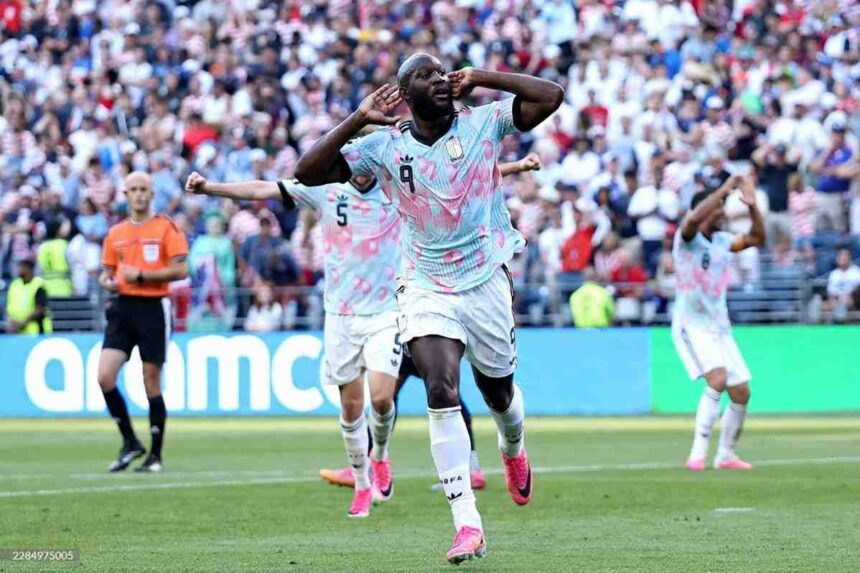 Belgium forward Romelu Lukaku 9 celebrates with hands to ears after scoring Belgiums fourth goal during the 2026 FIFA World Cup Round of 16 match between USA and Belgium at Seattle Stadium in Seattle on July 6 2026 Belgium teammates 5 and 8 celebrate behind him  trybalnews