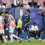 Uzbek referee Ilgiz Tantashev shows a yellow card to France forward Michael Olise 11 during the 2026 World Cup round of 16 match between Paraguay and France at Lincoln Financial Field in Philadelphia on July 4 2026  trybalnews