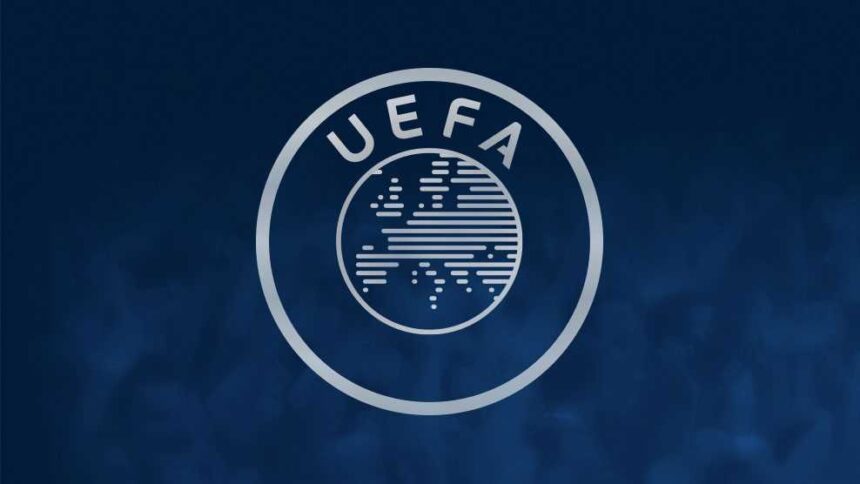 UEFA logo circular emblem with a striped globe and the letters UEFA arched on a dark blue background  trybalnews