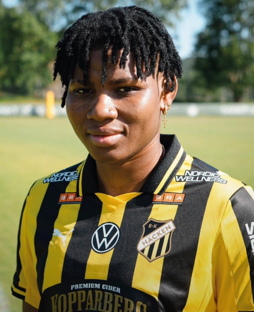 Portrait of a person with short dreadlocks wearing a black and yellow striped soccer jersey outdoors  trybalnews