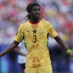 Ghana national football player in a yellow kit with number 3 arms outstretched on the field  trybalnews