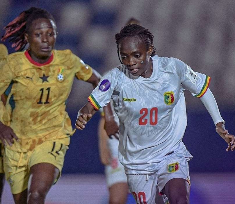 Female soccer players sprint for the ball in a match white jersey with number 20 leads a chase against a yellow jersey opponent no 11  trybalnews