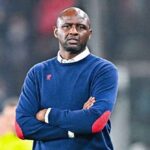 Former Genoa head coach Patrick Vieira stands with arms crossed on the sideline wearing a navy blue sweater with red elbow patches during the Serie A match between Genoa CFC and US Cremonese at Luigi Ferraris Stadium  trybalnews
