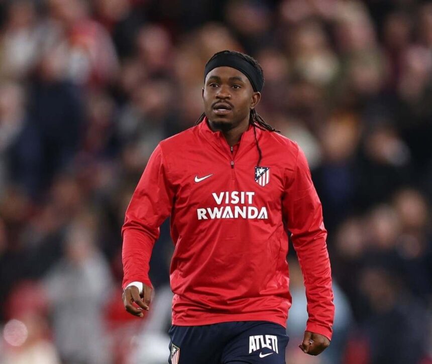 Ademola Lookman of Atletico de Madrid wearing a red and white striped jersey and blue shorts warms up during half time on the pitch at Anfield during the UEFA Champions League 202627 League Phase match between Liverpool FC and Atletico de Madrid on September 9 2026 in Liverpool England  trybalnews