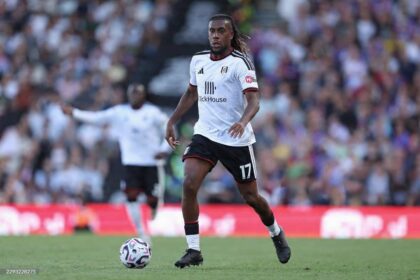 Nigeria international Alex Iwobi wearing Fulham’s white home kit with number 17, dribbling the ball during the Premier League 2026/27 match between Fulham and Crystal Palace at Craven Cottage in London, United Kingdom on September 5, 2026.