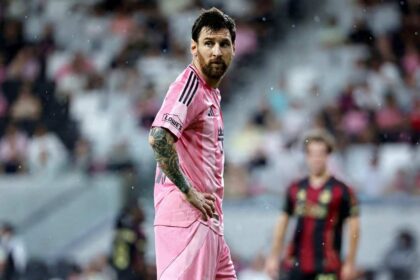 Lionel Messi of Inter Miami CF stands with hands on hips wearing a pink home jersey during the MLS match between Inter Miami CF and Atlanta United FC at Miami Freedom Park in Miami, Florida on September 5, 2026.
