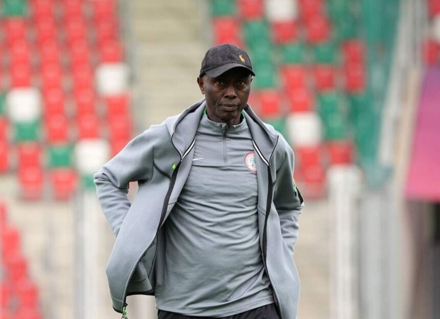 Moses Aduku Head Coach of Nigeria stands on the pitch wearing a grey Nigeria tracksuit and black cap before the FIFA U 20 Womens World Cup Group F match between Spain and Nigeria at Arena Sosnowiec in Sosnowiec Poland on September 7 2026  trybalnews