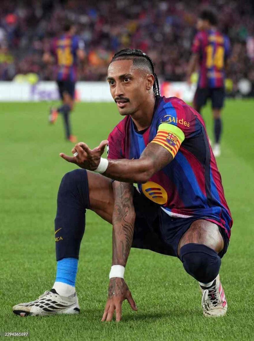 Raphinha of FC Barcelona wearing the captains armband crouches on the pitch and gestures with his hands after scoring during the UEFA Champions League 202627 League Phase match between FC Barcelona and Feyenoord at Camp Nou in Barcelona Spain on September 9 2026  trybalnews