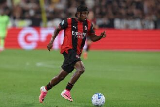 Nigeria winger Samuel Chukwueze wearing AC Milan’s red and black striped home kit, dribbling the ball during the Serie A match between Juventus and AC Milan at the stadium in Turin, Italy on September 6, 2026.