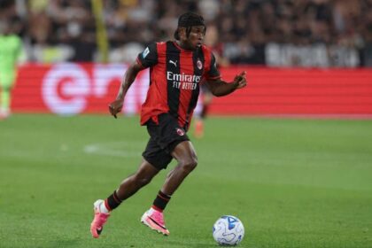 Nigeria winger Samuel Chukwueze wearing AC Milan’s red and black striped home kit, dribbling the ball during the Serie A match between Juventus and AC Milan at the stadium in Turin, Italy on September 6, 2026.