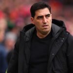 Bournemouth manager Andoni Iraola looking on from the touchline during a Premier League match at Anfield  trybalnews