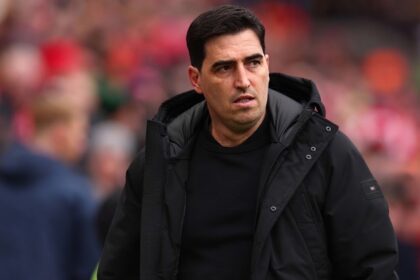 Bournemouth manager Andoni Iraola looking on from the touchline during a Premier League match at Anfield
