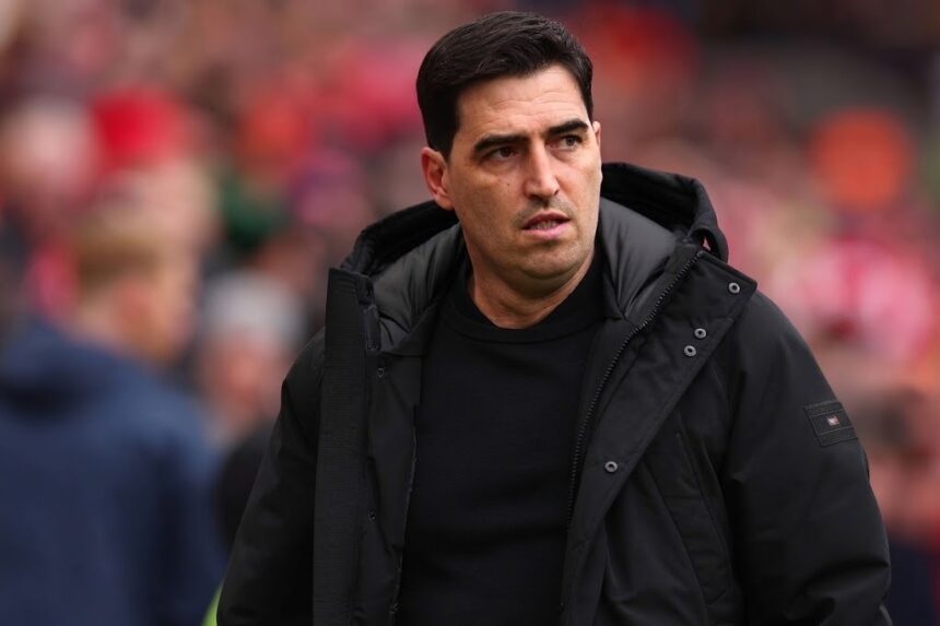 Bournemouth manager Andoni Iraola looking on from the touchline during a Premier League match at Anfield  trybalnews