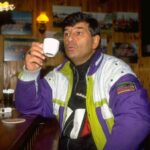 Long  Descriptive ALT Legendary Dutch manager Clemens Westerhof who led Nigerias Super Eagles to AFCON victory relaxing with a coffee cup in a wooden cabin  trybalnews