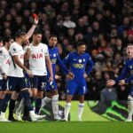 Chelseas Cole Palmer with arms outstretched in disbelief as referee shows red card during Premier League match against Tottenham Hotspur at Stamford Bridge teammates and opponents watching  trybalnews