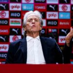 Portugal head coach Jorge Jesus speaking during a post match press conference at Estadio do Dragao gesturing with his hand raised while addressing the media  trybalnews