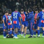 Khvicha Kvaratskhelia of Paris Saint Germain gets injured and is assisted off the pitch by medical staff during Champions League match against FC Barcelona at Parc des Princes  trybalnews