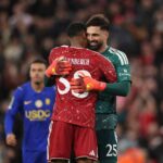 Liverpool players Ryan Gravenberch and Giorgi Mamardashvili celebrate after Carabao Cup match against Chelsea at Anfield  trybalnews