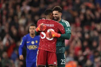 Liverpool players Ryan Gravenberch and Giorgi Mamardashvili celebrate after Carabao Cup match against Chelsea at Anfield  trybalnews