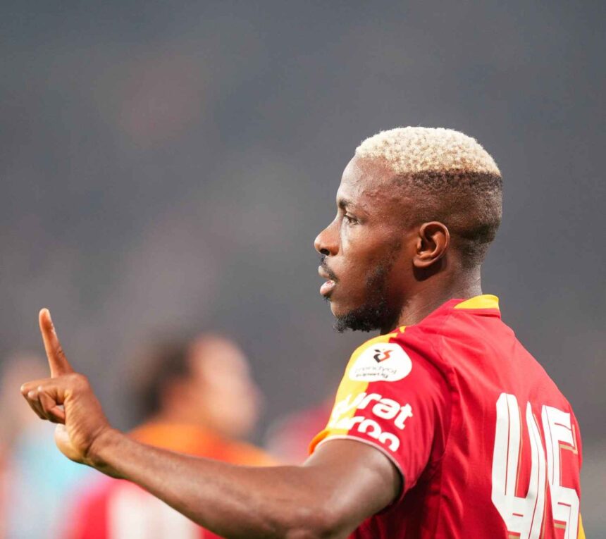 Victor Osimhen gestures with his finger raised while wearing a Galatasaray red and yellow jersey during a Turkish Super Lig match  trybalnews
