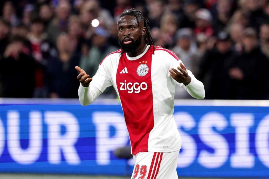 Tolu Arokodare Trybal News Tolu Arokodare wearing Ajax number 99 jersey celebrates 1 0 goal during Conference League match vs Atalanta at Johan Cruijff Arena in Amsterdam trybalnews